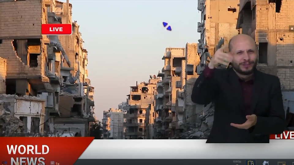 The same newscast with the interpreter enlarged on the right, face, hands and upper body clearly visible, while the resize pointer is still on screen.